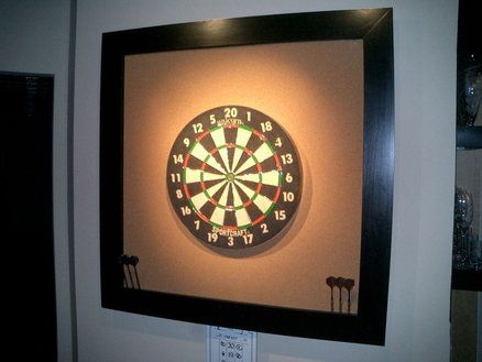 Dart Board Surround. DIY project out of cork bulletin board & 2" rigid foam board in a wood frame. Hung with a french cleat for stability. Cool! Homemade Wall Decorations, Dart Board Wall, Diy Projects For Men, Man Room, Dart Board, Diy Room, Wood Gifts, Cork Board, Basement Remodeling