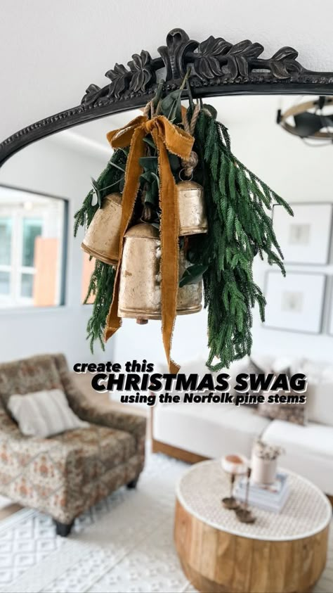 102 reactions · 32 shares | create this Christmas swag using the viral Norfolk pine stems from @kirklands. easy to put together and hang anywhere (think mirrors, sconces, above a fireplace mantle)! small touches of christmas here + there and I love it! 🎄like and save for later ✨ follow @styledbybeck for more holiday inspo! . . Christmas styling | home decor | Christmas swag | Kirklands | Norfolk pine | gold bells | velvet trim | velvet ribbon | holiday decor | diy Christmas | holiday ideas | hol Minimal Christmas Mantle, Mirror Christmas Decor Ideas, Diy Christmas Swag, Kirklands Home Decor, Holiday Decor Diy Christmas, Yule 2024, Holiday Decor Diy, Christmas Decorating Hacks, Christmas Neutral