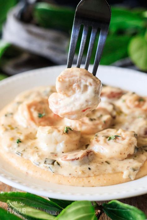 Southern shrimp and grits is an easy dinner recipe that can be on the table in under 45 minutes. Featuring Cajun sausage, cheese, and real cream, it’s a simple Southern comfort food that is oh so good. Try it tonight with fresh Georgia white shrimp. Shrimp And Grits With Cajun Cream Sauce, Southern Shrimp And Grits, Shrimp N Grits Recipe, White Shrimp, Cajun Sausage, Southern Comfort Food, Cajun Food, Grits Recipe, Shrimp Grits