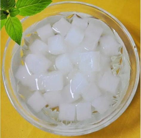 Nata De Coco is a chewy, translucent, jelly-like food produced by the fermentation of coconut water which gels through the production of C cellulose by Komagataeibacter xylinus. Nata de coco is mainly made from coconut water, so it has a modest nutritional profile. Nata de coco can be consumed on its own, but it can be used as an ingredient as well for fruit salads, halo-halo, coconut cakes, ice creams, soft drinks, bubble tea, and yoghurts. Coconut Cakes, Coconut Charcoal, Coconut Products, Coconut Jelly, Coconut Pudding, Desiccated Coconut, Vietnam Food, Kawaii Cooking, Halo Halo