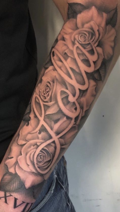 Name Tattoo On Inside Of Arm, Name Tattoo With Roses Forearm, Negative Space Name Tattoo, Her Name Tattooed On Him, Names With Roses Tattoos, Name Tattoos Sleeve, Sleeve Tattoo For My Daughter, Big Name Tattoos On Arm, Name On Hip Tattoo