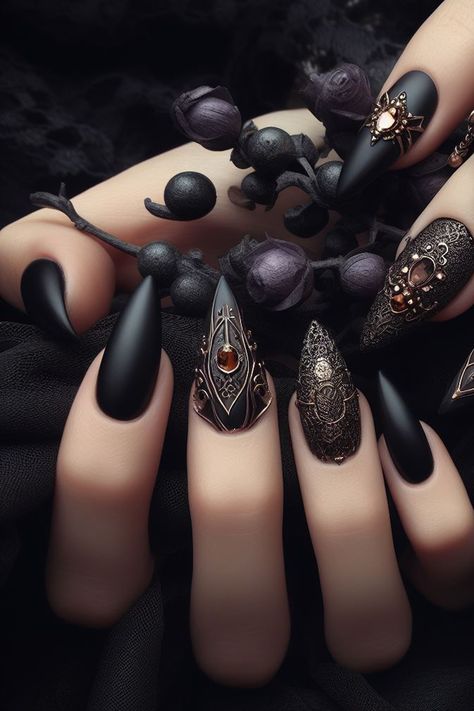 These black gothic nails are perfect for the October Halloween Season. The moody black base is contrasted with sparkling red and bronze gold rhinestones and embellishments, creating a look that is both eye-catching and mysterious. #gothicnails #blacknails #redrhinestones #nailart #edgynails #octobernails #halloweennails Black Moody Nails, Bronze And Black Nails, Black Red And Gold Nails, Black Gothic Nails, Moody Nails, Gothabilly Fashion, Black And Nude Nails, Vampy Makeup, Red And Gold Nails