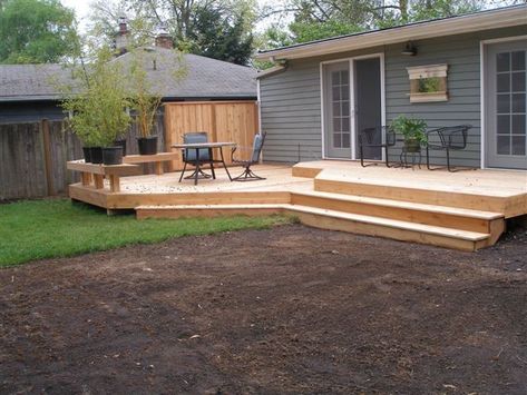 Concrete Blocks: Instead of expensive foundations, use concrete deck blocks. Minimal Hardware: Choose basic deck screws and brackets; avoid costly hardware unless necessary. Paint or Stain: Refresh reclaimed wood with affordable deck paint or stain. Suggested #Tags #DIYDeck #GroundLevelDeck #BudgetDeckBuilding #PlatformDeckIdeas #BackyardProjects #OutdoorLiving #DeckInspiration #EcoFriendlyDeck #HomeImprovement #WeekendProject Platform Decks Backyard, Platform Deck Ideas, Deck Designs Layout, Diy Ground Level Deck, Deck On The Ground, Wood Deck Ideas, Low Deck Designs, Deck On A Budget, Backyard Decking