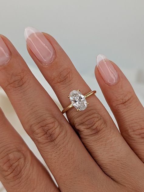 Gold Band Ring With Diamond, Wedding Rings Engagement Gold Band, Gold Band And Diamond Ring, Good Band Oval Engagement Ring, Wedding Rings Gold Band Oval Diamond, Oval With Gold Band Engagement Ring, 1.25 Carat Oval Engagement Ring, Yellow Gold Oval Ring, Pale Gold Engagement Rings