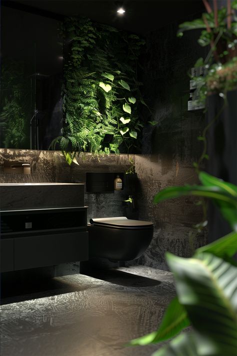 Urban Jungle • Dramatic bathroom draped in lush vertical gardens and textured dark walls • Modern matte black toilet contrasts against rustic stone surfaces • Floating vanity with dark stone countertop and minimalist fixtures • Recessed lighting spotlights the vibrant foliage and stone textures • Dark, wood-toned flooring brings an earthy foundation to the space • Strategically placed green plants add life and a breath of fresh air • A sanctuary where nature meets modern design Black And Green House Aesthetic, Jungle Toilet Design, Dark Biophilic Design, Dark Bathroom Plants, Dark Small Bathroom, No Window Bathroom, Small Dark Bathroom Ideas, Green Dark Aesthetic, Dark Bathroom Aesthetic