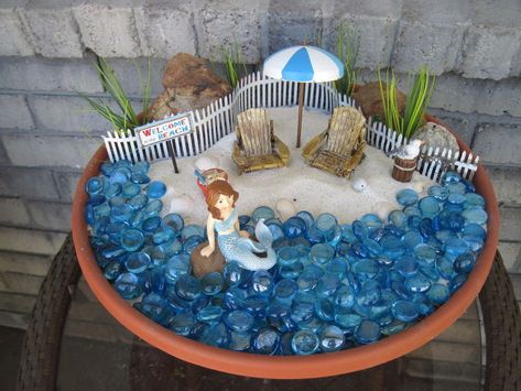 beach themed fairy garden, container gardening, gardening, repurposing upcycling Fairy Garden Design Ideas, Blue Pebbles, Mermaid Garden, Beach Fairy Garden, Diy Fairy Garden, Fairies Garden, Fairy Homes, Mini Gardens, Fairy Garden Designs