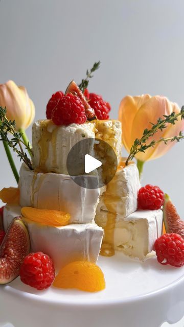 Marissa Mullen on Instagram: "Now THIS is my type of cheesecake 🧀 Celebrating one year of That Cheese Plate Wants To Party with a springtime floral twist on the book cover! 🎂  For this cake I used Brie, Camambert and Boursin. I decorated with fruit, honey and flowers. Make sure you use edible flowers, or as an extra barrier wrap each stem in plastic and use a toothpick to place it into the cheese. Remove before eating!   Thanks for celebrating with me this week as I reminisce on the past year! The book is still 50% off for a limited time, comment PARTY and I’ll message you the link directly! 🎉  #ThatCheesePlateWantsToParty" Brie Cake Ideas, Cheese Wedding, Cheese Wedding Cake, Italian Lunch, Catering Ideas, Brie Cheese, My Type, Cheese Plate, Edible Flowers