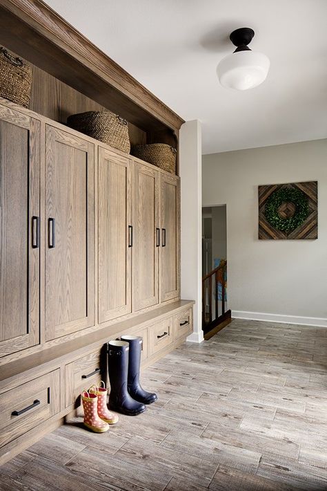 Stylish natural wood lockers in a mudroom