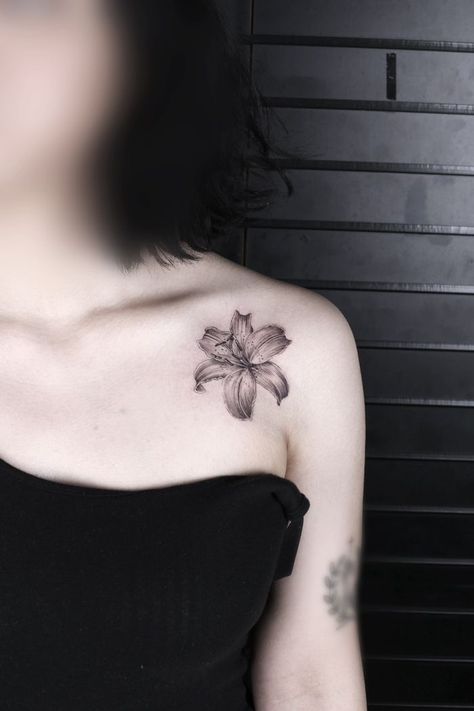 250+ Lily Tattoo Designs With Meanings (2020) Flower ideas & Symbols Black Lillies Tattoo, Lily's Tattoo, Black Lily Tattoo, Lily Shoulder Tattoo, Lilly Tattoos, Lily Tattoo Designs, Shoulder Tattoos For Females, Lilly Flower Tattoo, Stargazer Lily Tattoo