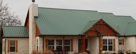 A colored metal roof can add style to your home. Green Tin Roof, House Metal Roof, Green Metal Roof, Roof Pictures, Tin Roof House, Green Roof House, Log Cabin Exterior, Metal Roof Houses, Brick Roof