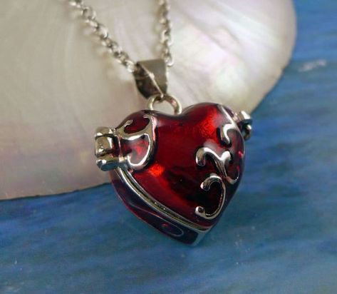 Petite Red enamel prayer box heart seaglass locket. This is a very colorful ruby red small heart-shaped locket. It is enamel with silver scroll designs covering the top and sides. The top opens from a hinge on the left side, and closes with a clasp on the right side. The inside of the heart is silver. I added a drop of genuine seaglass to get you started if you want to add your tiny beach treasures. Or do you have a wish or prayer? Write it down and keep it safe in this heart, which will be clos Wish Box, Prayer Box, Stash Box, Heart Locket Necklace, Dope Jewelry, Funky Jewelry, Jewelry Lookbook, Heart Locket, Girly Jewelry