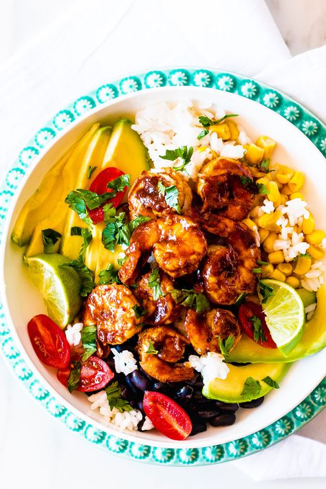 These Adobo Shrimp Bowls are loaded with flavorful and juicy shrimp, rice, black beans, tomatoes, avocados, and corn, then drizzled with a fresh cilantro lime dressing! https://www.spotebi.com/recipes/adobo-shrimp-bowls-cilantro-lime-dressing/ Adobo Shrimp, Cilantro Lime Dressing Recipe, Quick Nutritious Meals, Summer Tea Recipes, Shrimp Bowls, Rice Black Beans, Shrimp Rice, 2023 Food, Adobo Recipe