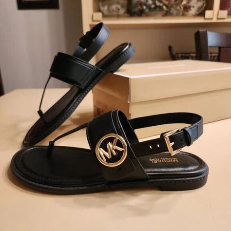 New In Box Thong Sandal Faux Leather 100% Polyurethane Lining: Polyurethane Blend Sole: Rubber Open Toe Gold Tone Buckle Fastening * Color : Black * Us Size - Medium Width Mk Sandals, Luxury Sandals, Girl Time, Pretty Sandals, Michael Kors Sandals, Cute Shoes Heels, Stunning Shoes, Classy Fashion, Summer Sandals