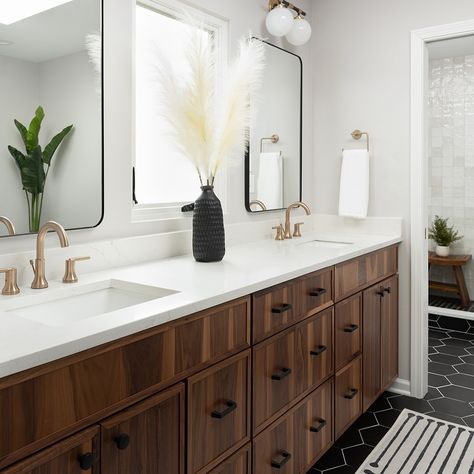 Timeless black and white, but the addition of wood details makes this bathroom a classic! From the walnut vanity to the coordinating stools in the shower and by the freestanding tub, there are warm details throughout. #cedChurchillDowners Photos by @pictureperfecthouse Hardware For Dark Wood Cabinets, Black And Brass Bathroom, Walnut Vanity, Wall To Wall Carpet, Chicago Interior Design, Dark Wood Cabinets, Wood Details, Bathroom Goals, Freestanding Tub