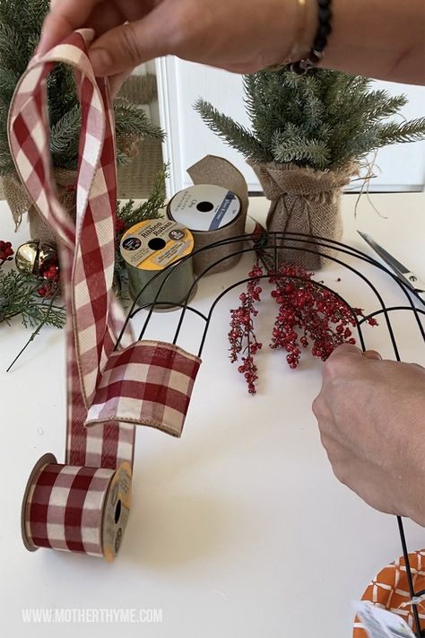 Dollar Tree Candy Cane Wreath - Mother Thyme Dollar Tree Candy Cane Wreath, Dollar Tree Candy Cane, Make A Ribbon Wreath, Candy Cane Wreath Tutorial, Candy Cane Wreath Diy, Bubble Wreath, Mother Thyme, Mesh Crafts, Ribbon Wreath Diy