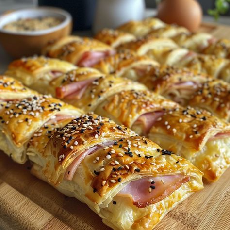 🧀 Snack time favorite alert: Ham and Cheese Sticks! Cheesy, hammy, utterly irresistible! #SnackTime 🍽️ Ham and Cheese Sticks 🛒 Ingredients: Puff pastry: 1 sheet Ham slices: 200g Cheddar cheese: 100g, sliced Egg: 1, beaten Sesame seeds: 1 tbsp 👩‍🍳 Instructions: Prep: Roll out pastry, layer with ham and cheese. Roll: Cut into strips, twist. 3sh, sprinkle with sesame seeds. Bake: 200°C for 15 mins until golden. 🌟 Perfect for parties or a quick snack, these sticks are a guaranteed hit! 🧀🥖 #Qu... Pinapple Ham, Cheese On A Stick, Pastries Savory, Small Plates Recipes, Food Studies, Ham Slices, Bake Sweets, Pasties Recipes, Plate Recipes