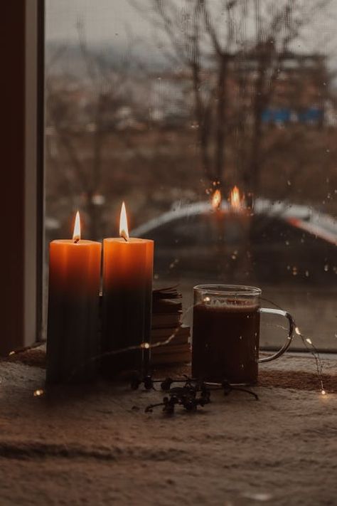 Kighted candles near the Glass Window · Free Stock Photo Photo Cup, Candle Picture, On A Rainy Day, Book Images, A Rainy Day, Close Up Photos, The Glass, Glass Window, Rainy Day