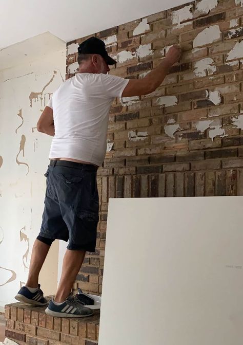 adhering cement board to the old brick wall Brick Fireplace Redo, Lime Wash Brick, Brick Fireplace Wall, Painted Brick Fireplace, Fireplace Redo, Cement Board, Old Brick Wall, Using A Paint Sprayer, Brick Fireplace Makeover