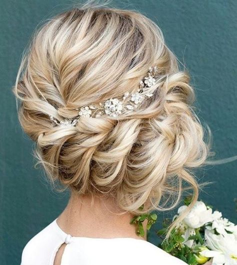 back view of blonde woman with pinned side bun hairstyle with floral accessories holding flowers Side Bun Hairstyles, Wedding Hair Side, Classic Wedding Hair, Side Bun, Twisted Updo, Braided Prom Hair, Prom Hairstyles For Long Hair, Wedding Hair Inspiration, Dc Wedding