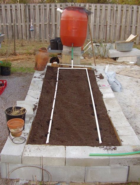 13 DIY Options for a Drip Irrigation System to Save You Time and Money Irrigation System Diy, Irrigation Diy, Drip Irrigation Diy, Garden Watering System, Water Irrigation, Drip System, Drip Irrigation System, Diy Water, Rain Barrel