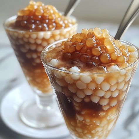 🥤 Cool down with a refreshing glass of Filipino Sago’t Gulaman—a sweet, icy treat you’ll love! 🧊✨ #SagotGulaman #FilipinoDrinks Filipino Sago’t Gulaman Ingredients: Sago pearls (1/2 cup) Gulaman (agar-agar, 1 pack, cooked and diced) Brown sugar (1 cup) Water (3 cups) Vanilla extract (1 tsp) Ice (as needed) Instructions: Cook sago pearls according to package instructions. Drain and set aside. In a pot, combine brown sugar and water. Cook until the sugar dissolves and thickens slightly. Add... Sago Pearls, Sago Recipes, Instagram Recipes, Agar Agar, Trending Recipes, Treat You, Baking Sweets, Pretty Food, Tasty Dishes