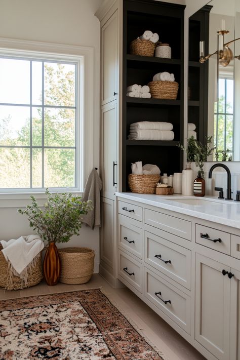 See examples of stunning black and white bathrooms that you can copy for your own home. Moody Bathroom With White Vanity, White Oak And Black Bathroom, Natural Bathroom Inspiration, Black White Natural Bathroom, Primary Bathroom White Cabinets, Guest Bathroom White Cabinets, Mix Gold And Black Hardware Bathroom, Bathroom White Cabinets Black Hardware, Oak And White Bathroom