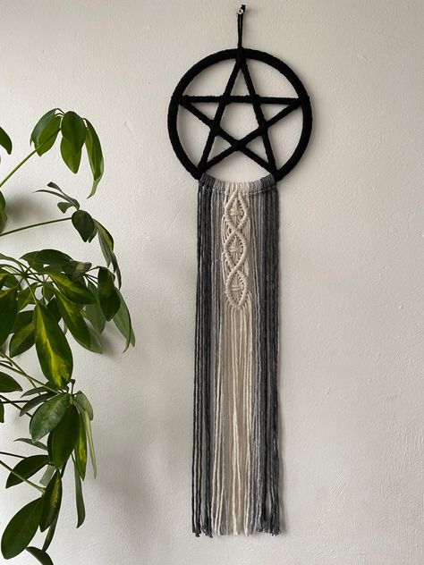 Monochrome pentagram wall hanging, gothic Wiccan decor, macrame boho wall hanging, living room wall art, pentacle, mystical witchy decor 20cm wooden pentagram shape, wrapped in black recycled cotton cord with long hanging tails in monochrome colours of natural, light grey and dark grey.  A mystical addition to any indoor space, this item is for decorative purposes only,& is not a toy. The tails hang down approximately 50cm from the pentagram shape.  Each item is individually handmade to order, & Wiccan Bathroom Decor, Macrame Pentagram, Wiccan Decor Diy, Witchy Macrame, Dark Macrame, Sigil For Protection, Witchy Bedroom Decor, Gothic Living Room Ideas, Mystical Gifts