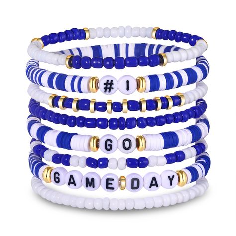 PRICES MAY VARY. ♥ Game Day Bracelets -- Support your favorite sports teams in style with our game day heishi bracelets. We offer a wide variety of colors and styles to match your favorite team's jerseys. These 8 strands of beaded stretch bracelets consist of tiny beads and 6mm polymer clay beads in vibrant team colors, accent with letter ‘#1’, ‘GO’ and ‘GAME DAY’, playful yet sophisticated. Embrace the thrill of gameday or liven up your everyday looks with these red/blue spirit day accessories High School Bracelets, School Color Clay Bracelets, Football Mom Accessories, School Spirit Beaded Bracelets, Homecoming Bracelets, Cheer Bracelets, Baseball Keychains, Sports Crafts, Bracelets Outfit