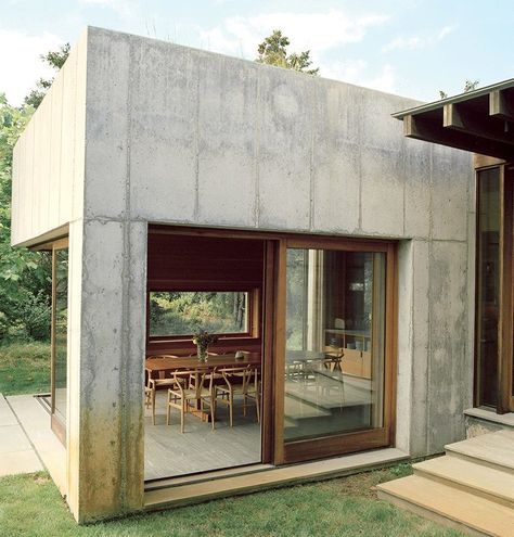 “We could lift up very easily the walls, the fittings, the shelves, the light fixtures, everything. You couldn’t have made this with wood or even steel.” —Peter Rose, architect Tagged: Dining Room, Ceramic Tile Floor, Table, and Chair.  Photo 3 of 11 in Six Concrete Boxes Make a Jaw-Dropping Martha's Vineyard Home Concrete Prefab House, Vineyard Home, Prefabricated Architecture, Concrete Houses, Concrete Facade, Concrete Architecture, Concrete Home, Casa Vintage, Prefabricated Houses