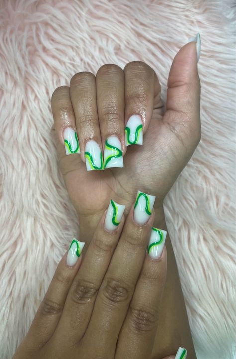 Mokky white base with green abstract lines on short duck nails. #nails #nailart #naildesign #ducknails #green #white Short Green Design Nails, Pink Green And White Nails, White And Green Nails Ideas, Christmas Nails In Green, White And Green Acrylic Nails, Green And White Nails Acrylic, White Nails With Green Designs, Nails With White Base, Nail Art With Lines