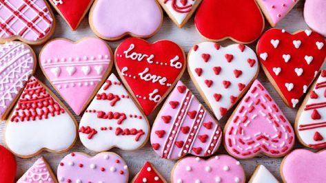 If your Valentine's Day plans involve staying in, make sure you make a few of these treats! Valentine Cookies Decorated, Valentines Day Sugar Cookies, Heart Sugar Cookie, Valentine Sugar Cookies, Valentines Baking, Royal Iced Cookies, Valentine Desserts, Valentines Day Cakes, Valentines Day Cookies