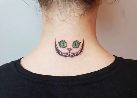 50+ Best Cheshire Cat Tattoo Designs - The Paws Cheshire Cat Tattoo Simple, Chesire Cat Tattoos Simple, Chesire Cat Tattoos, We're All Mad Here Tattoo, Cheshire Smile, Leo Things, Blue Ink Tattoos, Cheshire Cat Tattoo, Heart Tat