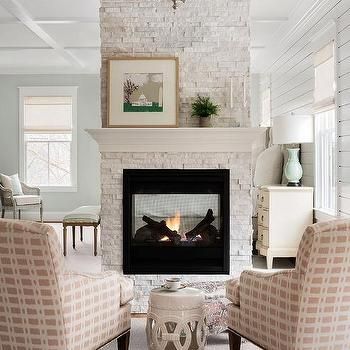 Multi Sided Fireplace - Transitional - Kitchen - Munger Interiors Double Fireplace, Square Wooden Coffee Table, Printed Accent Chairs, Grey Fireplace, White Abstract Wall Art, Fireplace Facing, Standing Fireplace, Two Sided Fireplace, Light Gray Cabinets