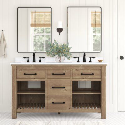 The distressed finish on this sleek 60" double vanity set brings tons of coastal farmhouse charm to your bathroom. Its freestanding frame is made from solid wood with an ash brown finish and wood scoring throughout for a rustic look. The white polished Carrara marble surface accommodates two porcelain undermount sinks (faucets sold separately), and it has a backsplash that protects your walls from splashes. Three central functional drawers give you a spot to keep various toiletries, while two sl Weathered Oak Vanity Bathroom, All Drawer Bathroom Vanity, 60” Double Sink Bathroom Vanity, 60 Inch Vanity One Sink, Small Double Vanity Bathroom, 60 Inch Vanity Double Sink, Modern Farmhouse Bathroom Vanity, Champagne Bedroom, Update Bathroom