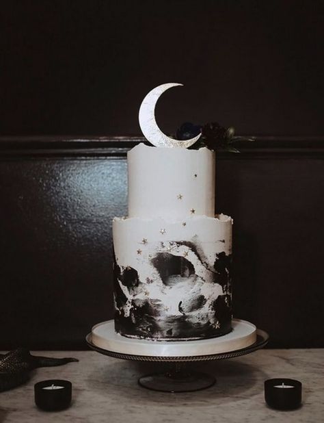 Elder goths and baby bats alike will love these spooky goth wedding cakes featuring skulls, lace, and lots and lots of black fondant. #goth #weddingcake #weddings Wedding Cakes With Fondant, Witchy Wedding Cake Toppers, Small Gothic Wedding Cake, Wiccan Wedding Cake, Goth Wedding Cake Ideas, Goth Backyard Wedding, Dark Fantasy Wedding Cake, Gothic Cake Wedding, Goth Wedding Cake Toppers