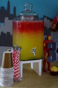 Red and yellow punch at a Avengers Iron Man birthday party! See more party ideas at CatchMyParty.com! Iron Man Drink, Yellow And Red Party Decor, Red And Yellow Decorations Party, Red And Yellow Drinks, Iron Man Birthday Party Ideas Decoration, Iron Man Party Decorations, Flash Party Decorations, Iron Man Birthday Party Ideas, Ironman Birthday Party