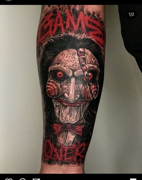 Horror Fan Tattoos, Scary Movie Tattoos Sleeve, Billy The Puppet Tattoo, Saw Tattoo Design, Jigsaw Tattoo Design, Django Tattoo, Saw Tattoo Jigsaw, Penny Wise Tattoo, Horror Characters Tattoo