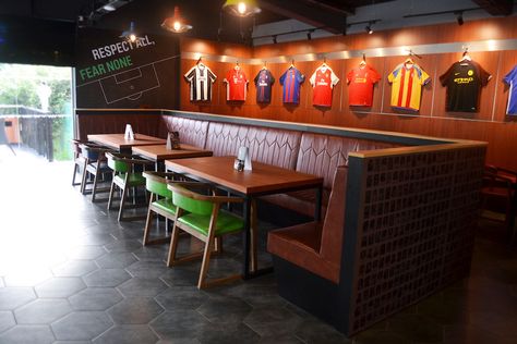 Given the name of this resto-bar – and the fact that it’s part-owned by football legends Ryan Giggs and Gary Neville – it would be a bit odd if they weren’t sho Football Pub, Resturant Decor, American Sports Bar, Sport Bar Design, Sports Bar Decor, Bar Lounge Room, Gary Neville, Ryan Giggs, Game Room Basement