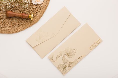 The cover is crafted from high-quality paper and features a stunning gold foil design that shimmers and shines in the light. It is the perfect choice for those looking to add a touch of sophistication and glamour to their special occasion.🥰 #moneyenvelopes #goldfoilenvelopes #shaguncover #chinesecashcovers Money Envelope Design, Shagun Envelopes, Money Envelope, Gold Foil Design, Foil Design, Wedding Invitation Card Design, Aesthetic Lifestyle, Money Envelopes, Cash Envelope