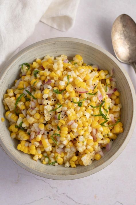 Ina Garten's corn salad recipe will be the hit of any party! Made with fresh corn, red onion, and cider vinegar, it's light, refreshing, and delicious! Ina Garten Corn Salad, Corn Recipes Side Dishes, Barefoot Contessa Recipes, Corn Salad Recipe, Corn Side Dish, Yummy Veggies, Ina Garten Recipes, Corn Salad Recipes, Refreshing Food