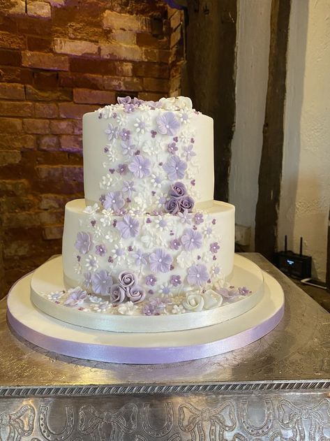 Joelle - small 2 tier wedding cake decorated with simple sugar flowers and tiny roses in shades of purple and lilac flowing down the front Small 2 Tier Wedding Cake, Wedding Cake Two Tier, Wedding Cakes Lilac, 2 Tier Wedding Cake, Quince Cakes, Lavender Wedding Cake, 2 Tier Wedding Cakes, Purple Wedding Cake, Purple Cakes Birthday