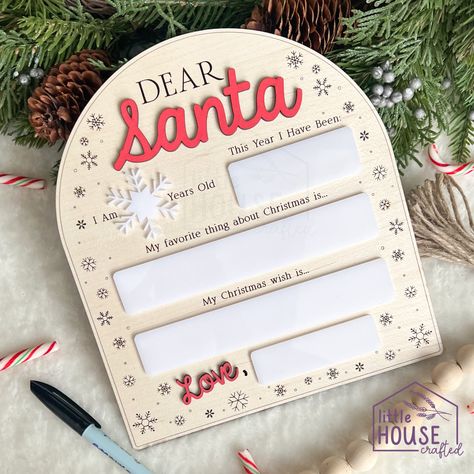 "This sign makes the perfect holiday photo prop!   After writing a letter to Santa, write it out on the board, and take a photo so you always know what their favorite thing was at Christmas, and what item they asked for.  Use a whiteboard or dry-erase marker on the white acrylic only.  I recommend using a wet-erase marker, which will not smudge when little fingers touch it.  These can be found on amazon, or most office supply stores.  You can also use dry-erase markers, but they do smudge when t Thunder Laser, Santa Board, A Letter To Santa, Writing A Letter, Christmas Photo Props, Letter To Santa, Laser Engraved Ideas, Advent Calenders, Whiteboard Marker