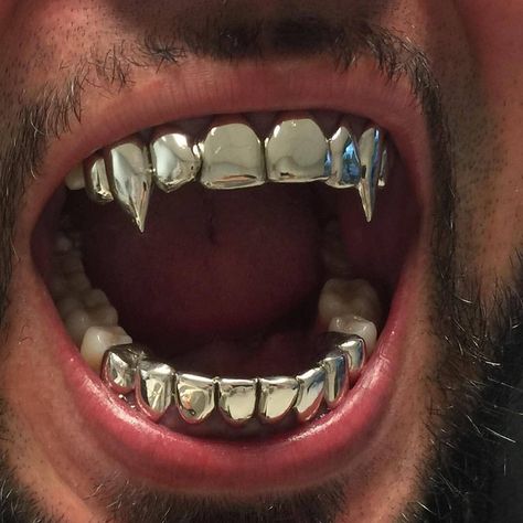 SKRT #skrtgang on Instagram: “Vampire Grillz” Vampire Grillz, Mouth Grills, Grillz Teeth, Diamond Grillz, Gold Grill, Gold Grillz, Grills Teeth, Tooth Gem, Gold Teeth