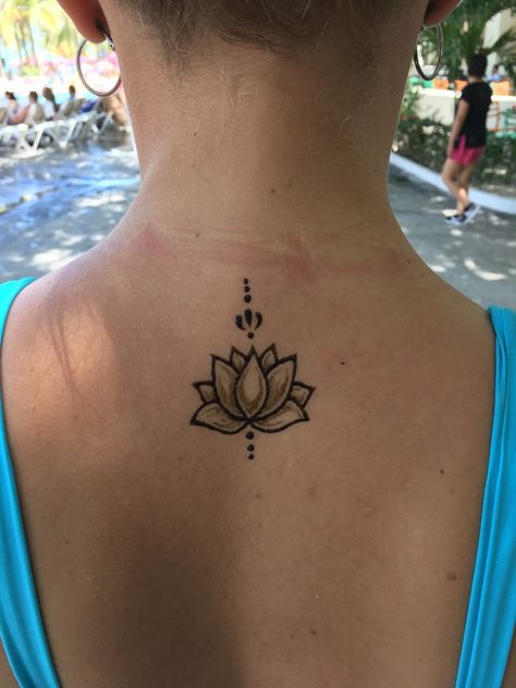 Lotus flower henna tattoo Henna Neck Tattoo Simple, Lotus Flower Henna Tattoo, Henna Tattoo Designs Flower Simple, Lotus Henna Design Simple, Lotus Flower Henna Design, Spine Henna Designs, Kana Tattoo, Henna Designs Lotus, Boho Henna Designs