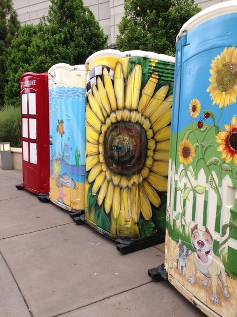 Hand painted porta potties Georgia   Street art Portapotty Ideas, Seaside Farmhouse, Quirky Toilet, Farmhouse Villa, Porta Potty, Georgia Street, Forest Cafe, Toilet Decor, Garden Fence Art