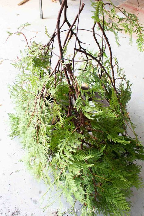 DIY Outdoor Evergreen Gnome Decor #christmas-decor #decor #diy #evergreen #nature #nature-decor #outdoor #outdoor-spaces #porch #upcycle#arts-and-crafts-ideas #nature-crafts #outdoor-spaces #rustic-decorating-ideas #sustainmycrafthabit Gnome Planter, Evergreen Planters, Gnome Accessories, Crafts Outdoor, Rustic Decorating, Diy Gnome, Crafting Wire, Wine Bottle Topper, Gnome Decor