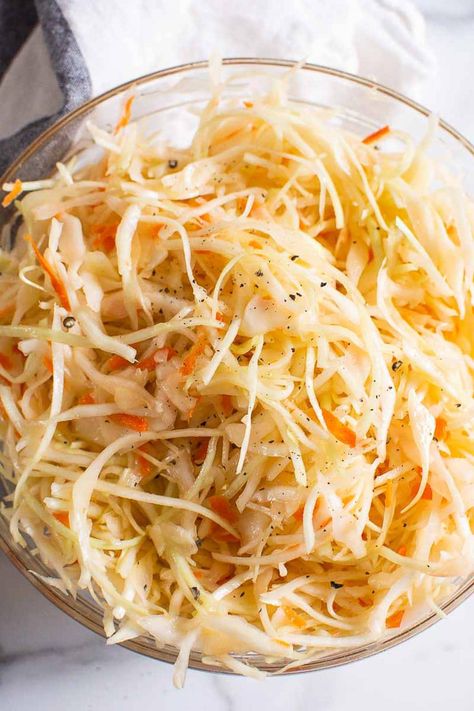 Vinegar Based Coleslaw is made with just 4 ingredients and without mayo. Fresh, easy and crispy it will be a hit at your next cookout! Vinegar Based Coleslaw, Vinegar Based Coleslaw Recipe, Healthy Coleslaw Recipes, Vinegar Coleslaw, Healthy Coleslaw, Coleslaw Salad, Slow Cooker Lentils, Leafy Green Salads, Crockpot Pulled Pork