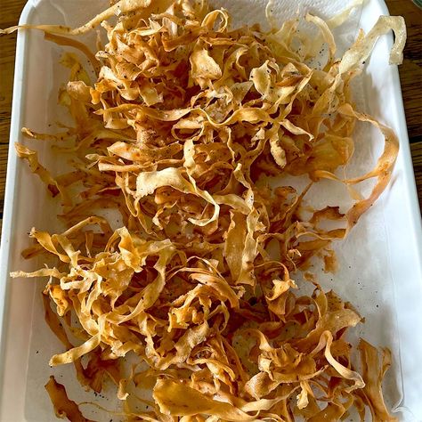 Yummy Parsnip crisps — These keep for at least a week in an airtight container. The same method can be applied to carrots, beetroots and a...... Parsnip Crisps, Secret Supper, Vegetable Peeler, Airtight Containers, Frying Oil, Parsnips, Apple Crisp, Saturated Fat, Vegan Gluten Free