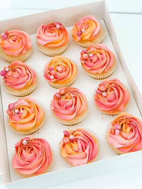 Orange Colored Cupcakes, Bridal Shower Sunset Theme, Sunset Cupcake Ideas, Peach Color Cupcakes, Sunset Theme Bridal Shower Ideas, Peach Theme Cupcakes, Pink And Orange Cupcake Ideas, Citrus Themed Cupcakes, Pink And Orange Bridal Shower Cookies