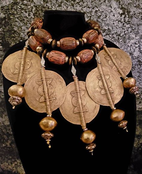 Check out this item in my Etsy shop https://www.etsy.com/listing/661082616/custom-order-only-african-brass-baule Rocker Chic Accessories, Coconut Wood, Unique Pendant Necklace, Chest Piece, African Queen, Mermaid Necklace, African Jewelry, Black Feathers, Statement Pendant